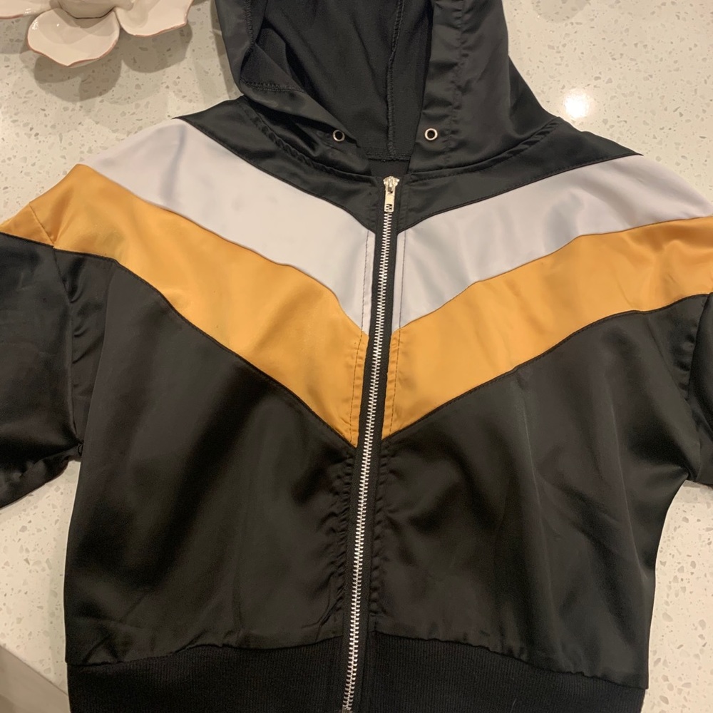 Black windbreaker